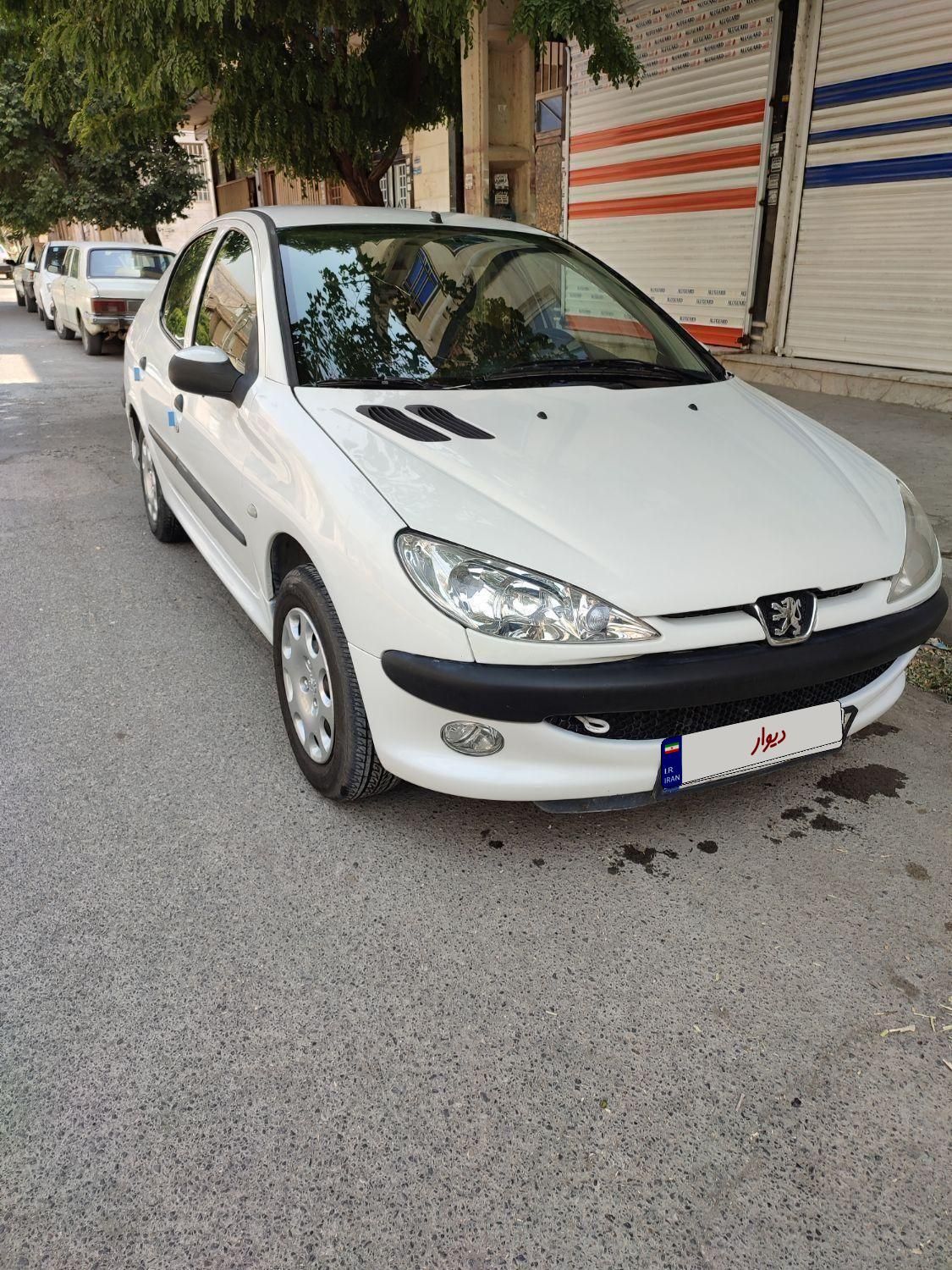 پژو ۲۰۶ صندوق دار v8 - 1394