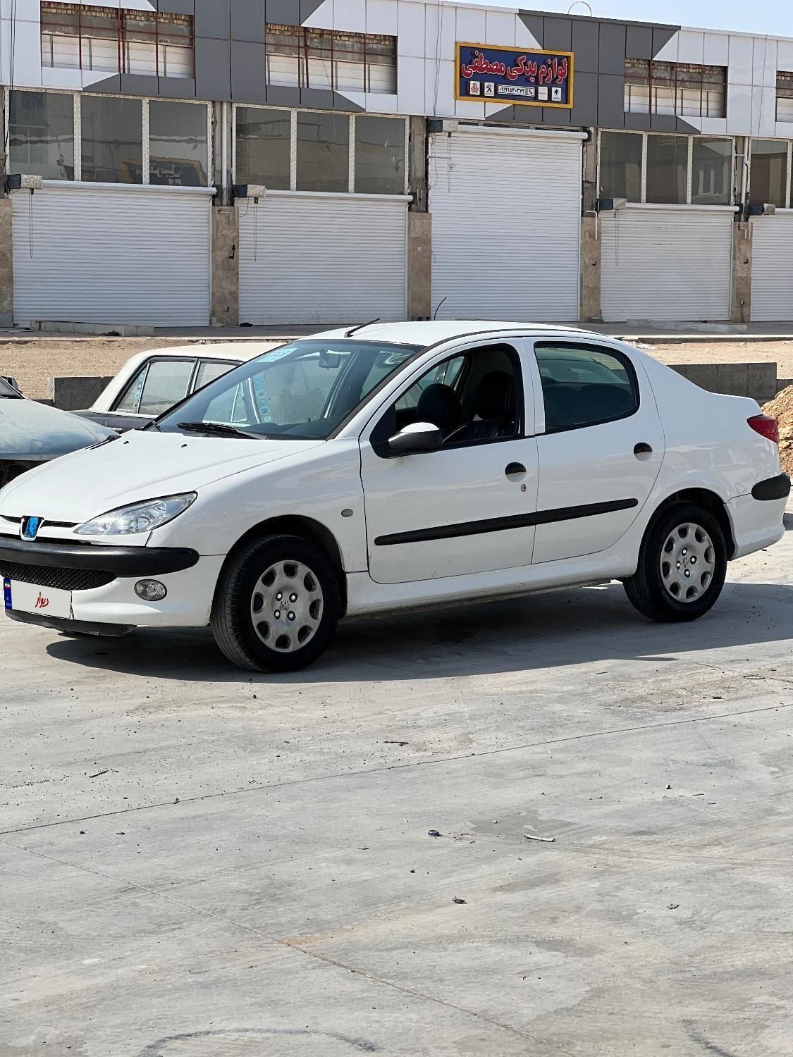 پژو ۲۰۶ صندوق دار v8 - 1395