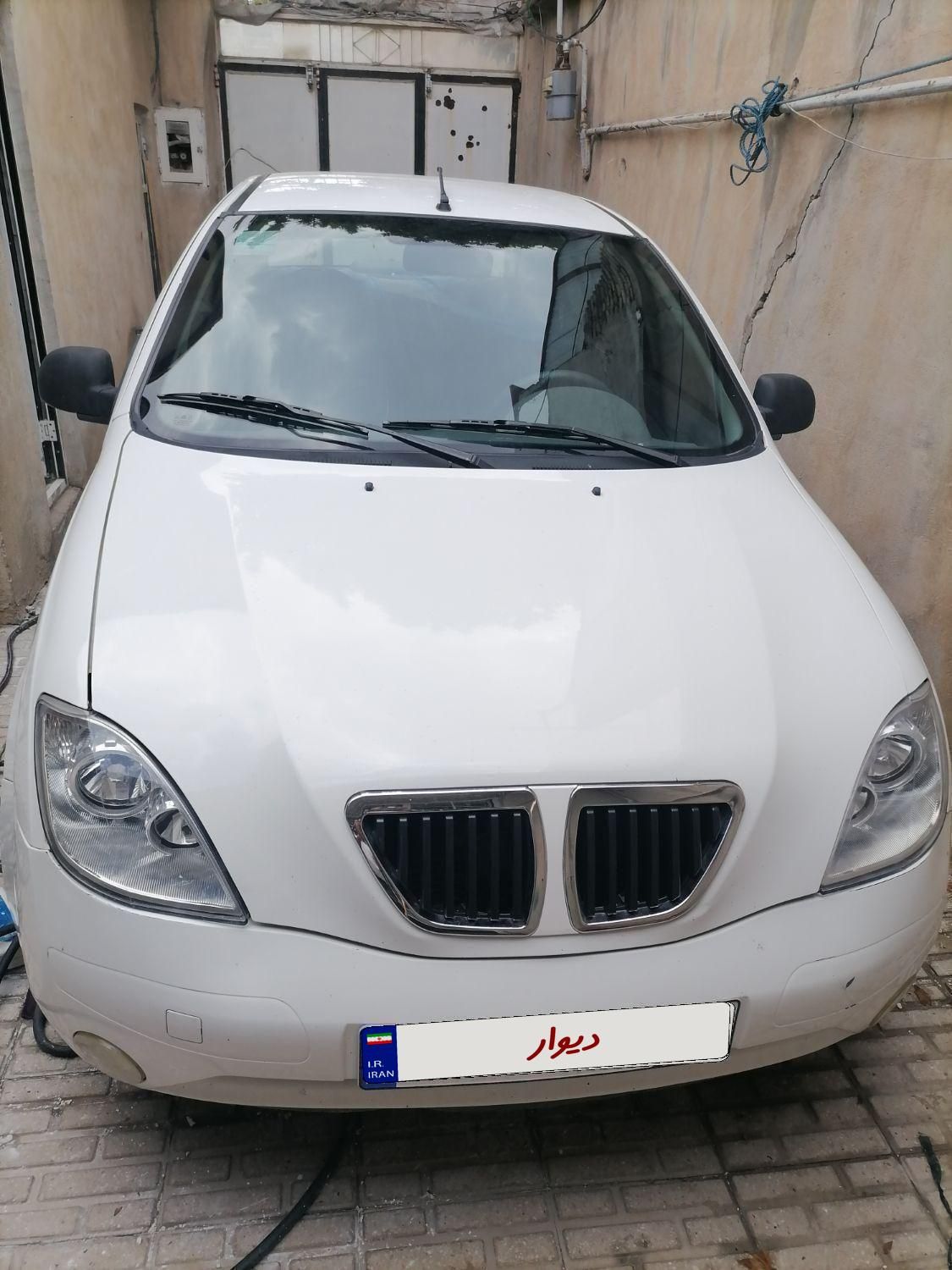 تیبا صندوق دار SX - 1392