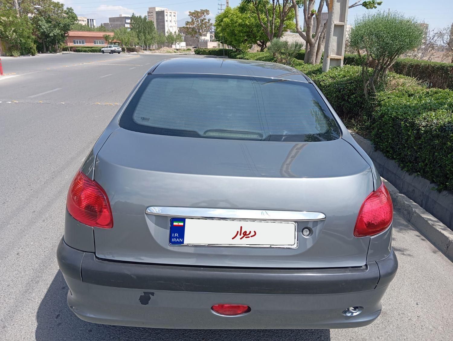 پژو ۲۰۶ صندوق دار v8 - 1391