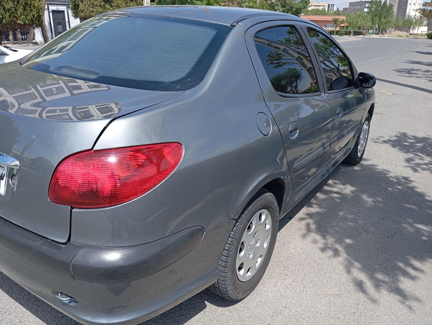 پژو ۲۰۶ صندوق دار v8 - 1391