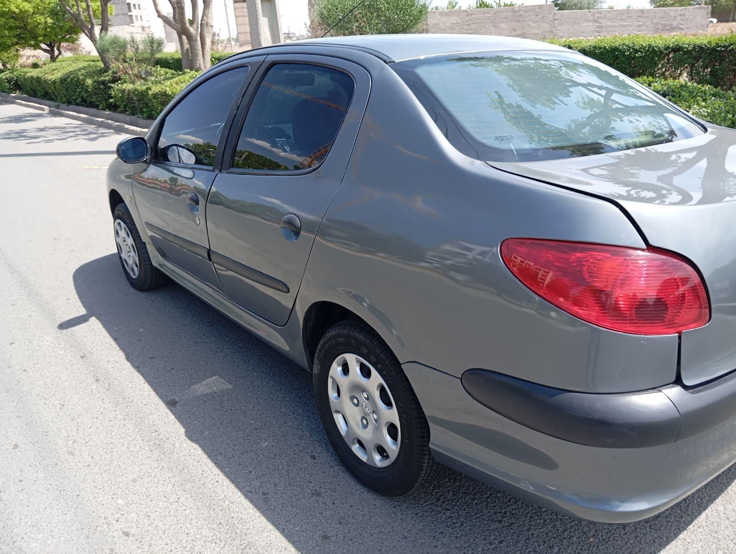 پژو ۲۰۶ صندوق دار v8 - 1391