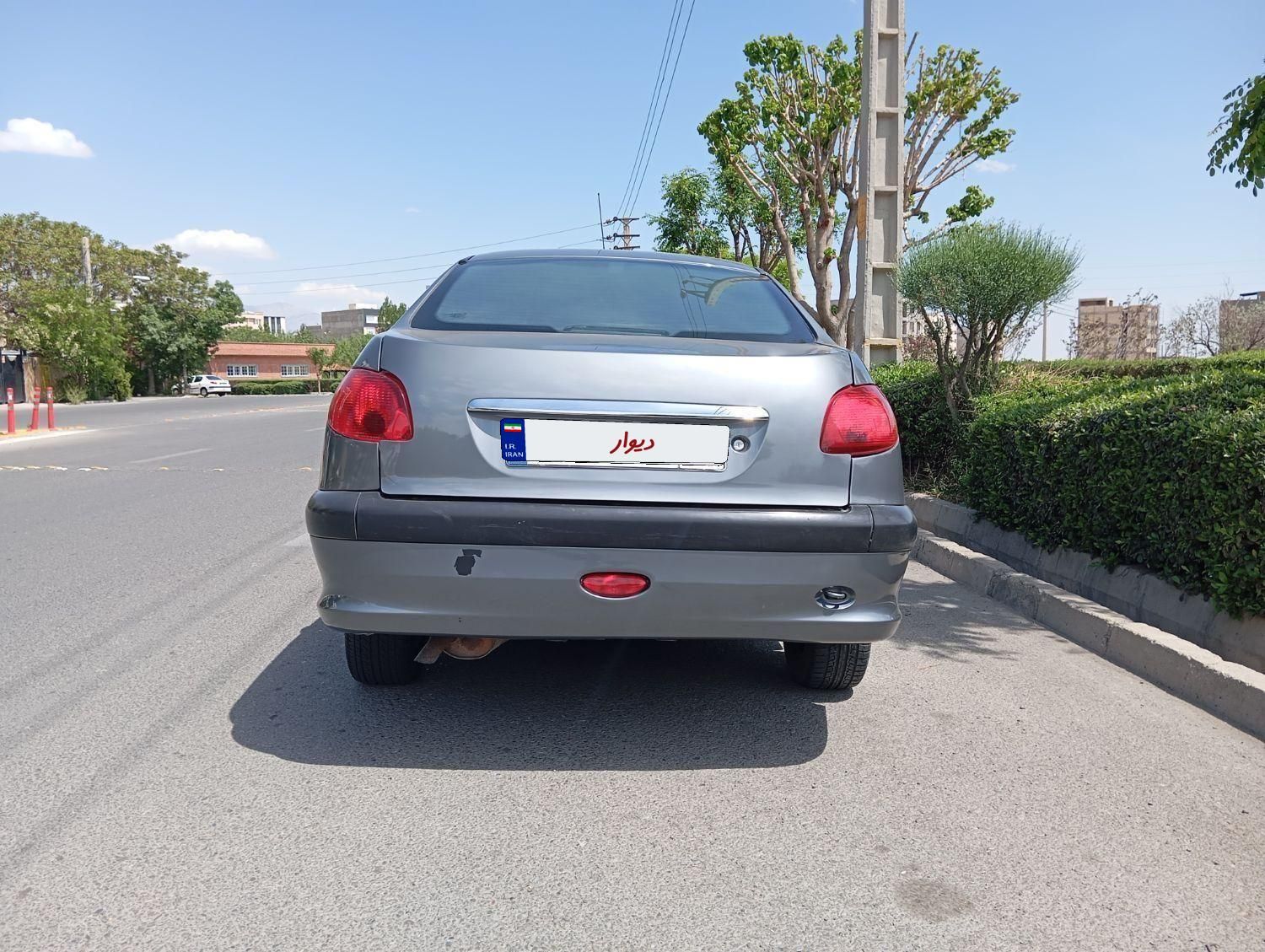 پژو ۲۰۶ صندوق دار v8 - 1391