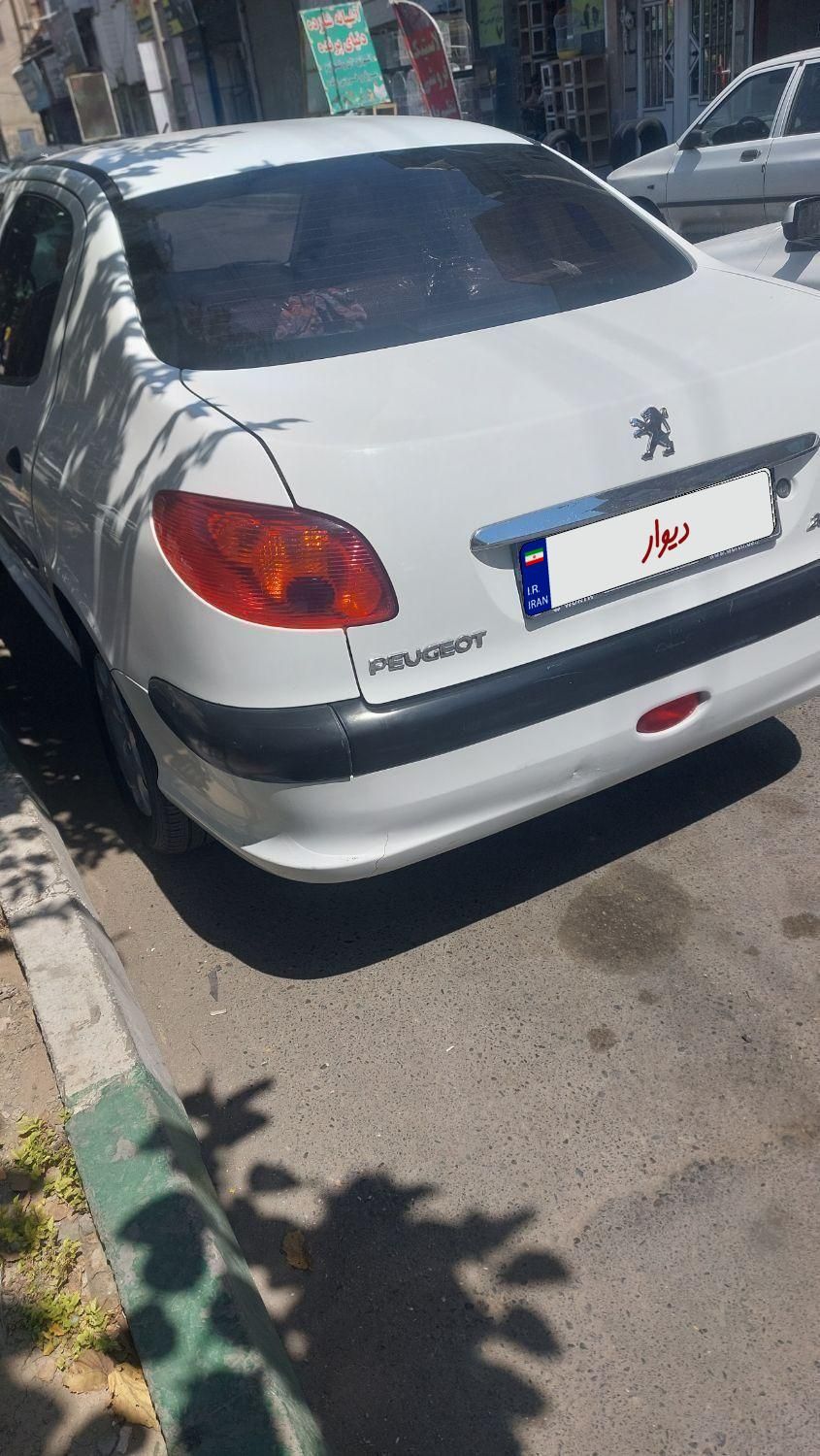 پژو ۲۰۶ صندوق دار v8 - 1398