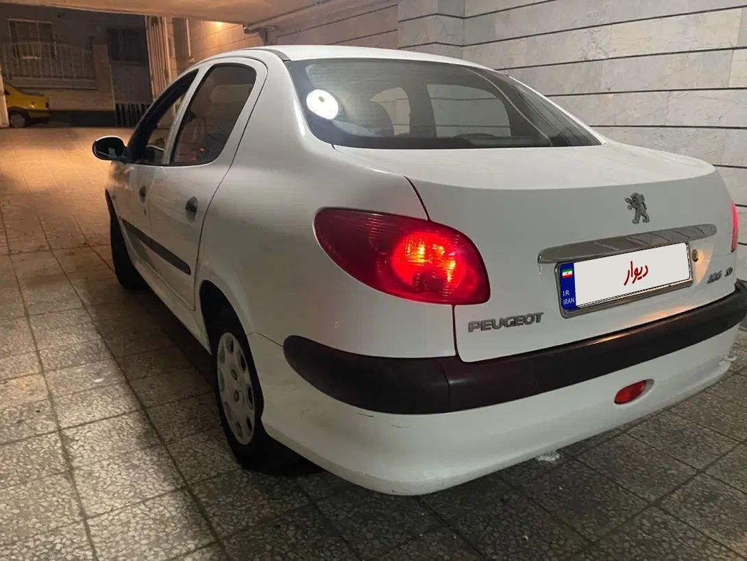پژو ۲۰۶ صندوق دار v8 - 1395
