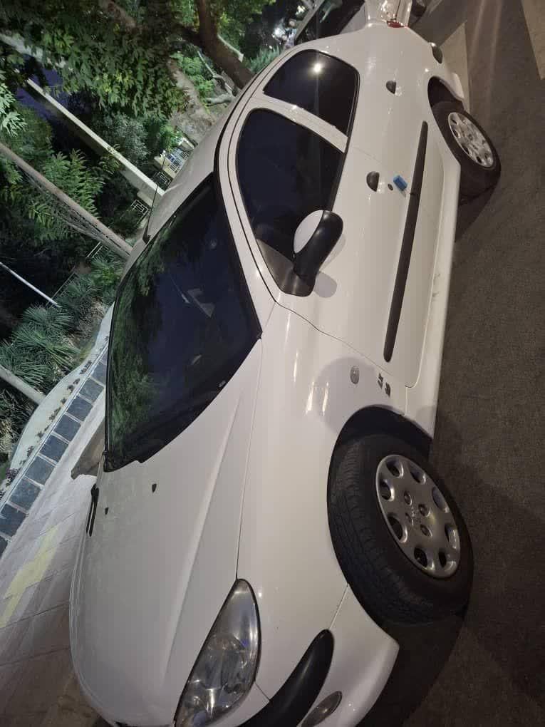 پژو ۲۰۶ صندوق دار v8 - 1399
