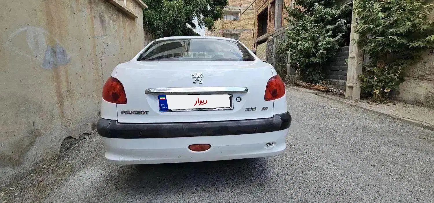 پژو ۲۰۶ صندوق دار v8 - 1397