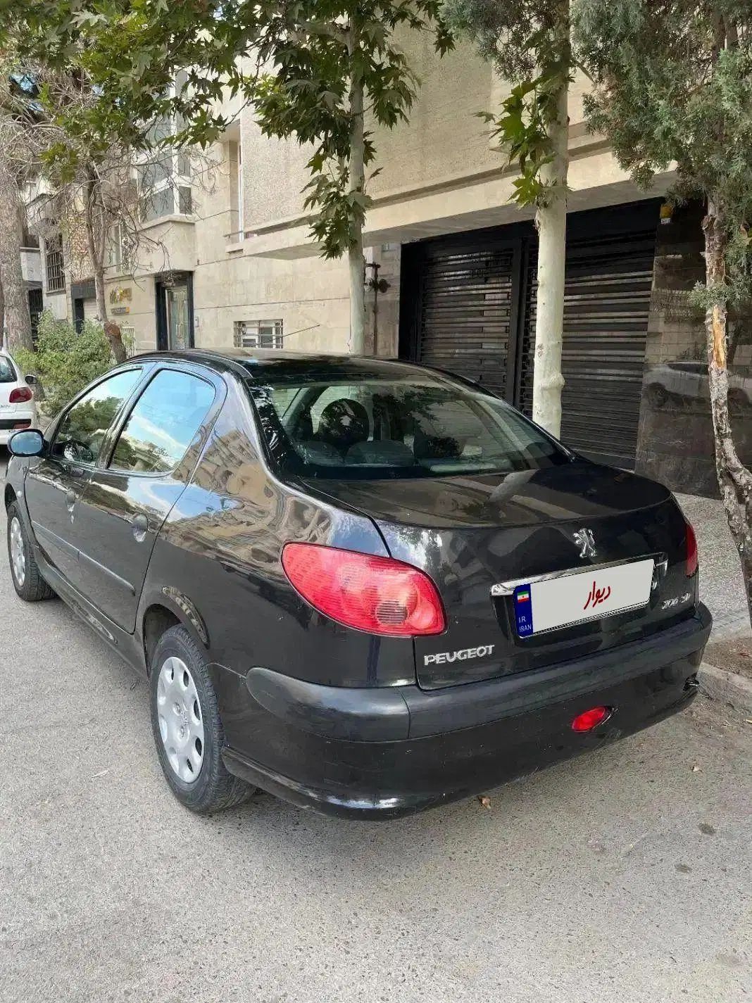 پژو ۲۰۶ صندوق دار v8 - 1392