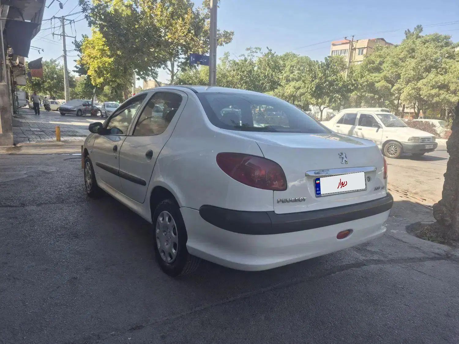 پژو ۲۰۶ صندوق دار v8 - 1390