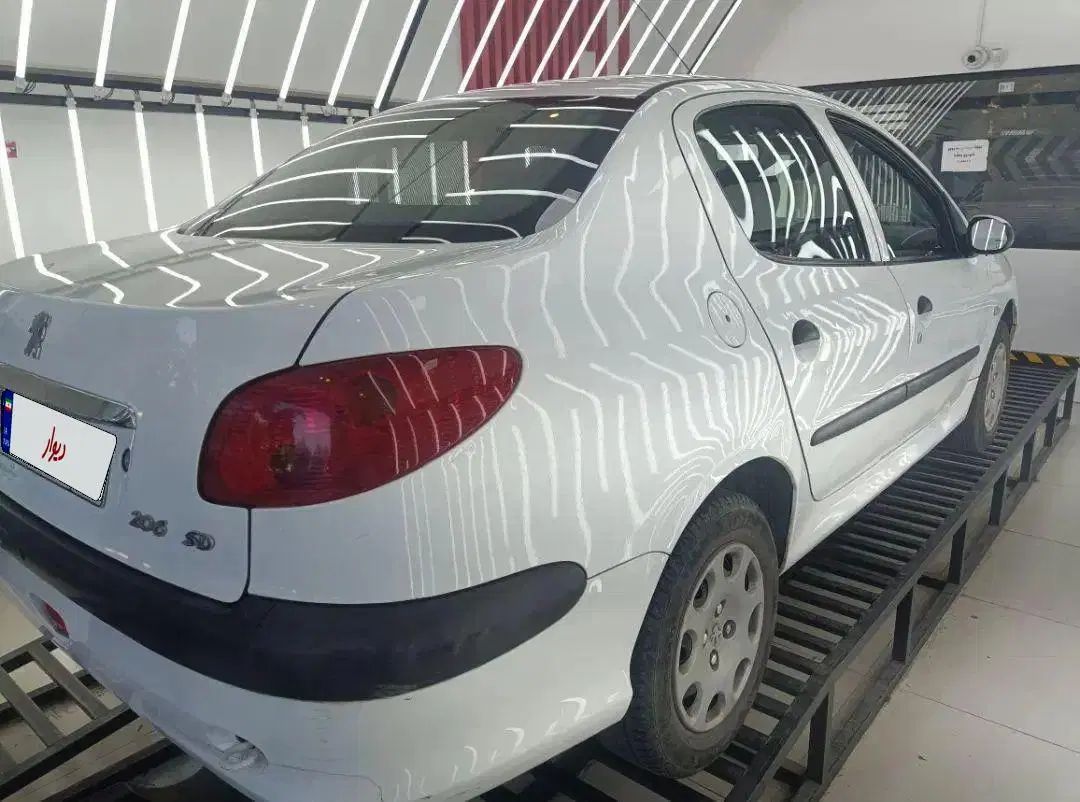 پژو ۲۰۶ صندوق دار v8 - 1394