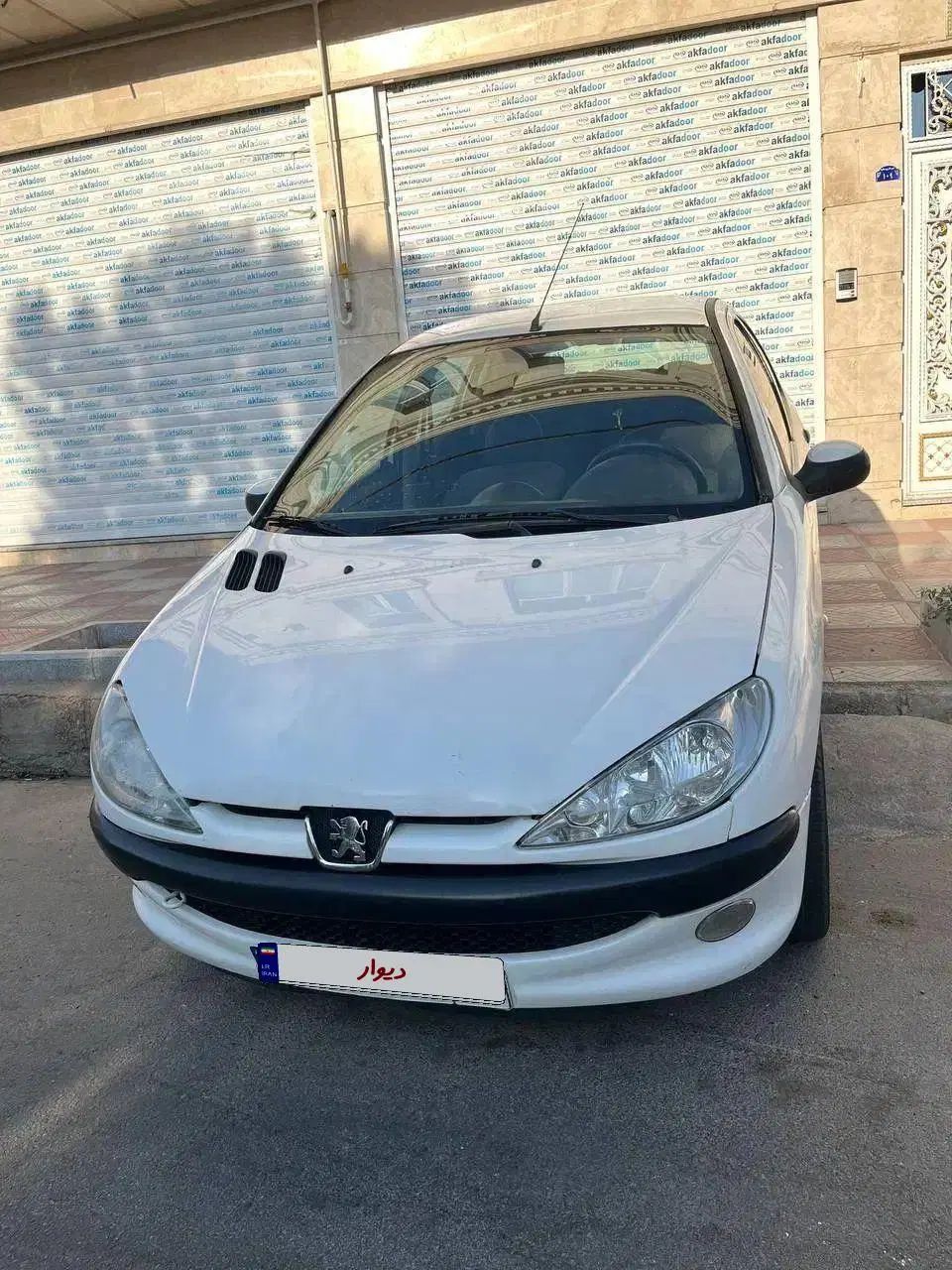 پژو ۲۰۶ صندوق دار v8 - 1396