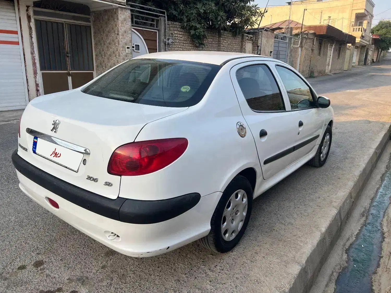پژو ۲۰۶ صندوق دار v8 - 1392