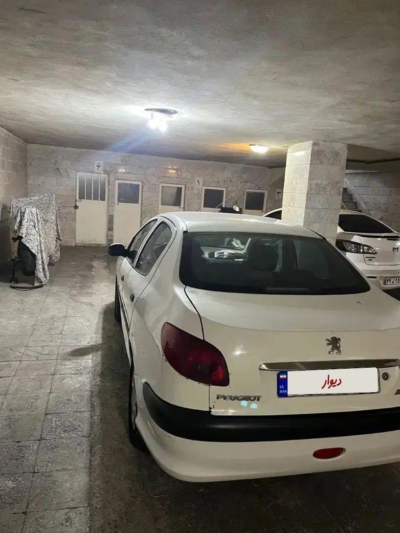 پژو ۲۰۶ صندوق دار v8 - 1395