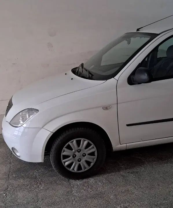 تیبا صندوق دار SX - 1400