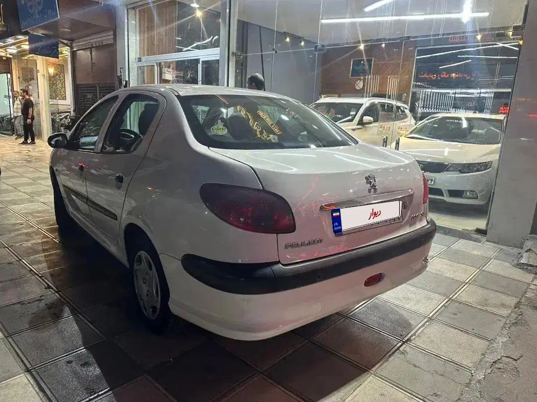پژو ۲۰۶ صندوق دار v8 - 1397