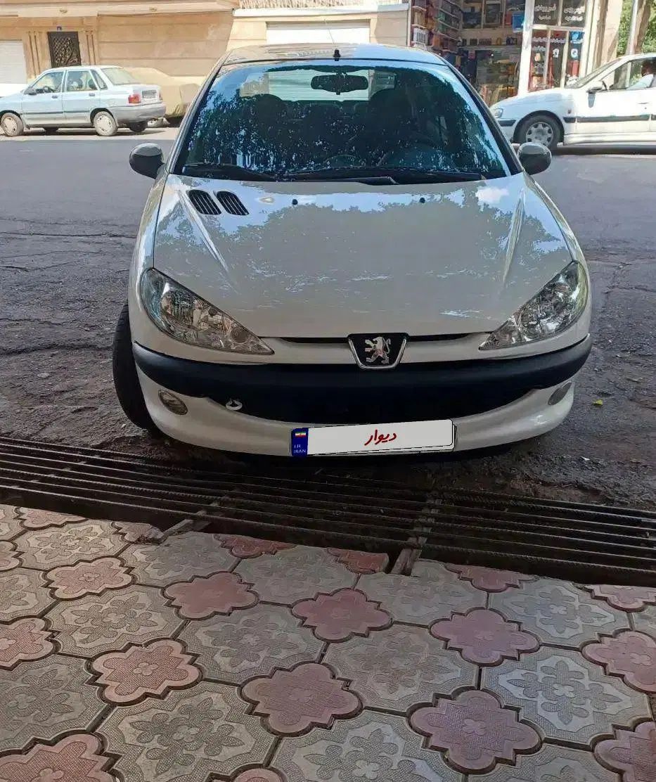 پژو ۲۰۶ صندوق دار v8 - 1396