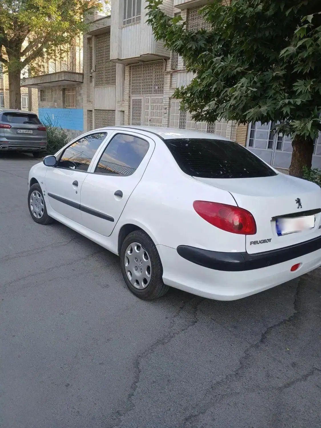 پژو ۲۰۶ صندوق دار v8 - 1395