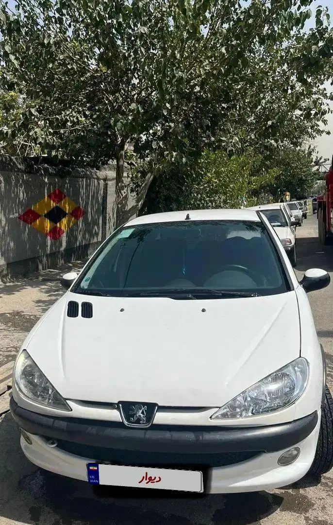 پژو ۲۰۶ صندوق دار v8 - 1396