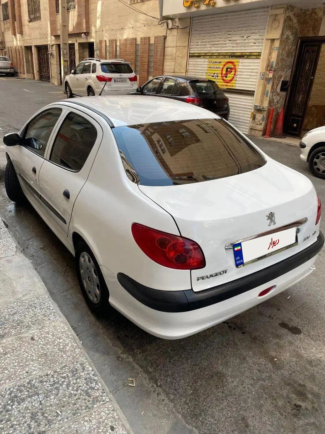 پژو ۲۰۶ صندوق دار v8 - 1395