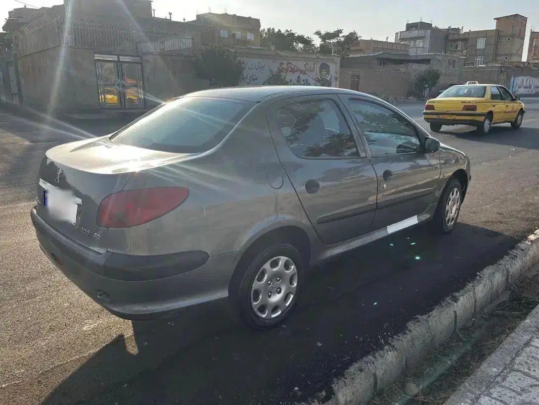 پژو ۲۰۶ صندوق دار v8 - 1396