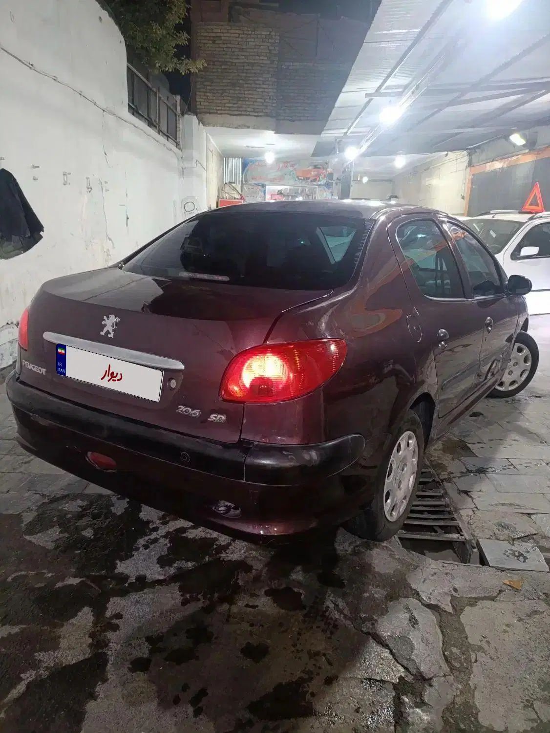 پژو ۲۰۶ صندوق دار v8 - 1396