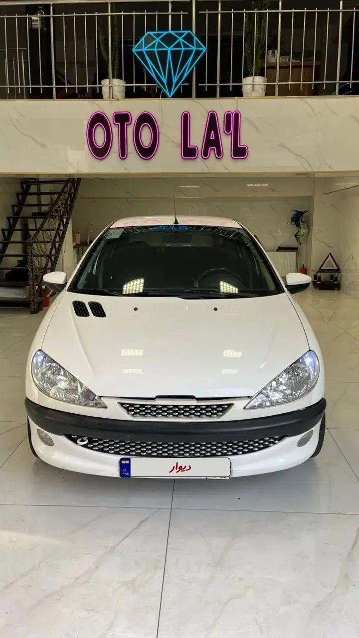 پژو ۲۰۶ صندوق دار v8 - 1396