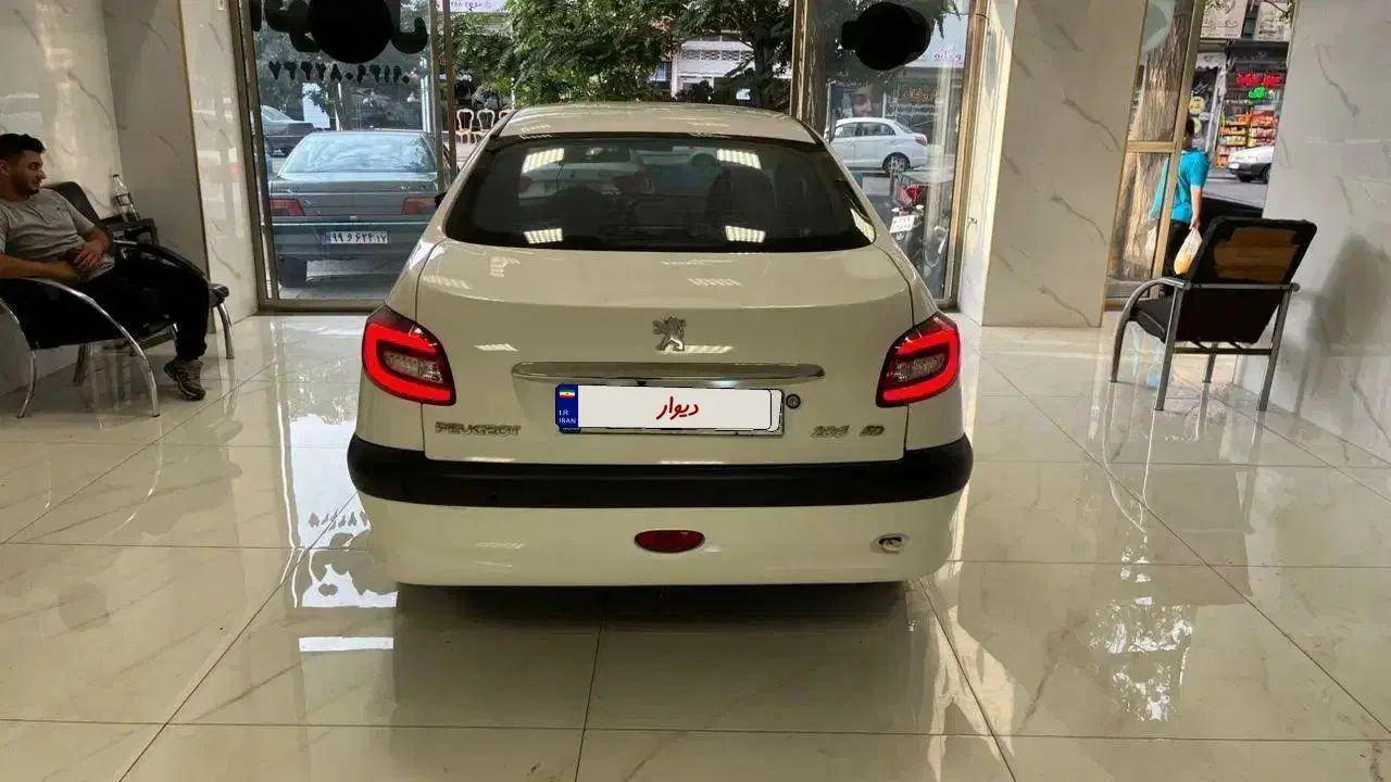 پژو ۲۰۶ صندوق دار v8 - 1396