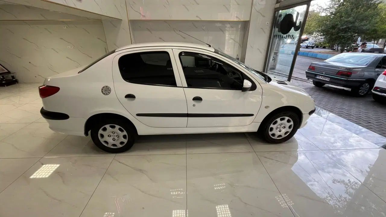 پژو ۲۰۶ صندوق دار v8 - 1396