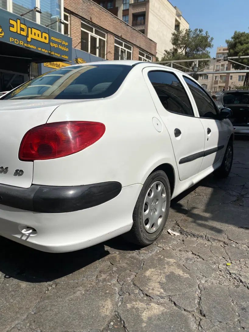 پژو ۲۰۶ صندوق دار v8 - 1396