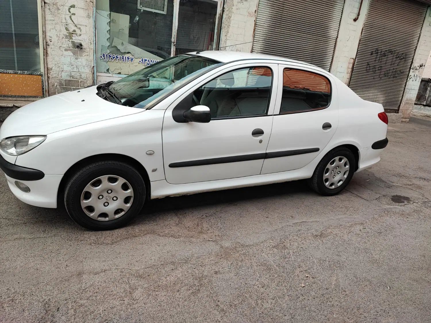 پژو ۲۰۶ صندوق دار v8 - 1398