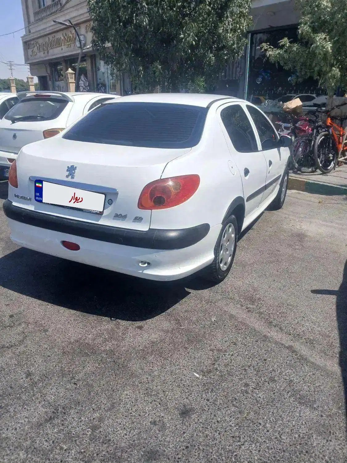 پژو ۲۰۶ صندوق دار v8 - 1394