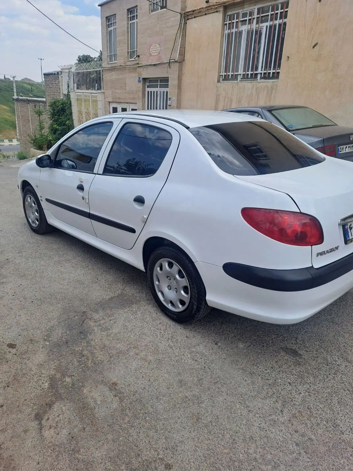 پژو ۲۰۶ صندوق دار v10 - 1390
