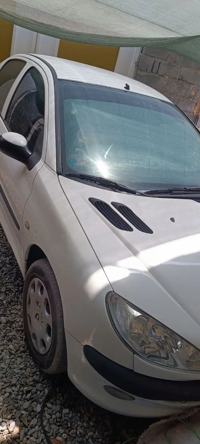 پژو ۲۰۶ صندوق دار v8 - 1396