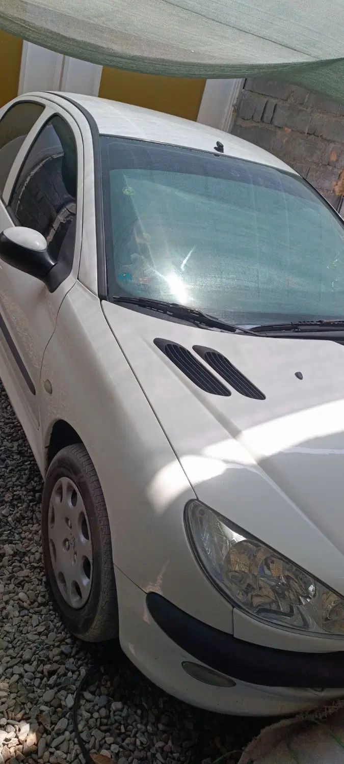 پژو ۲۰۶ صندوق دار v8 - 1396