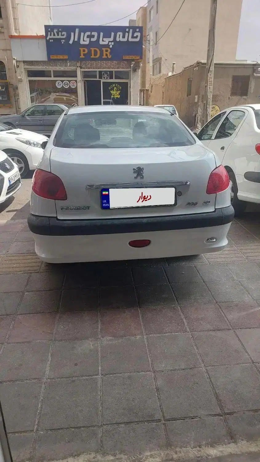 پژو ۲۰۶ صندوق دار v8 - 1397