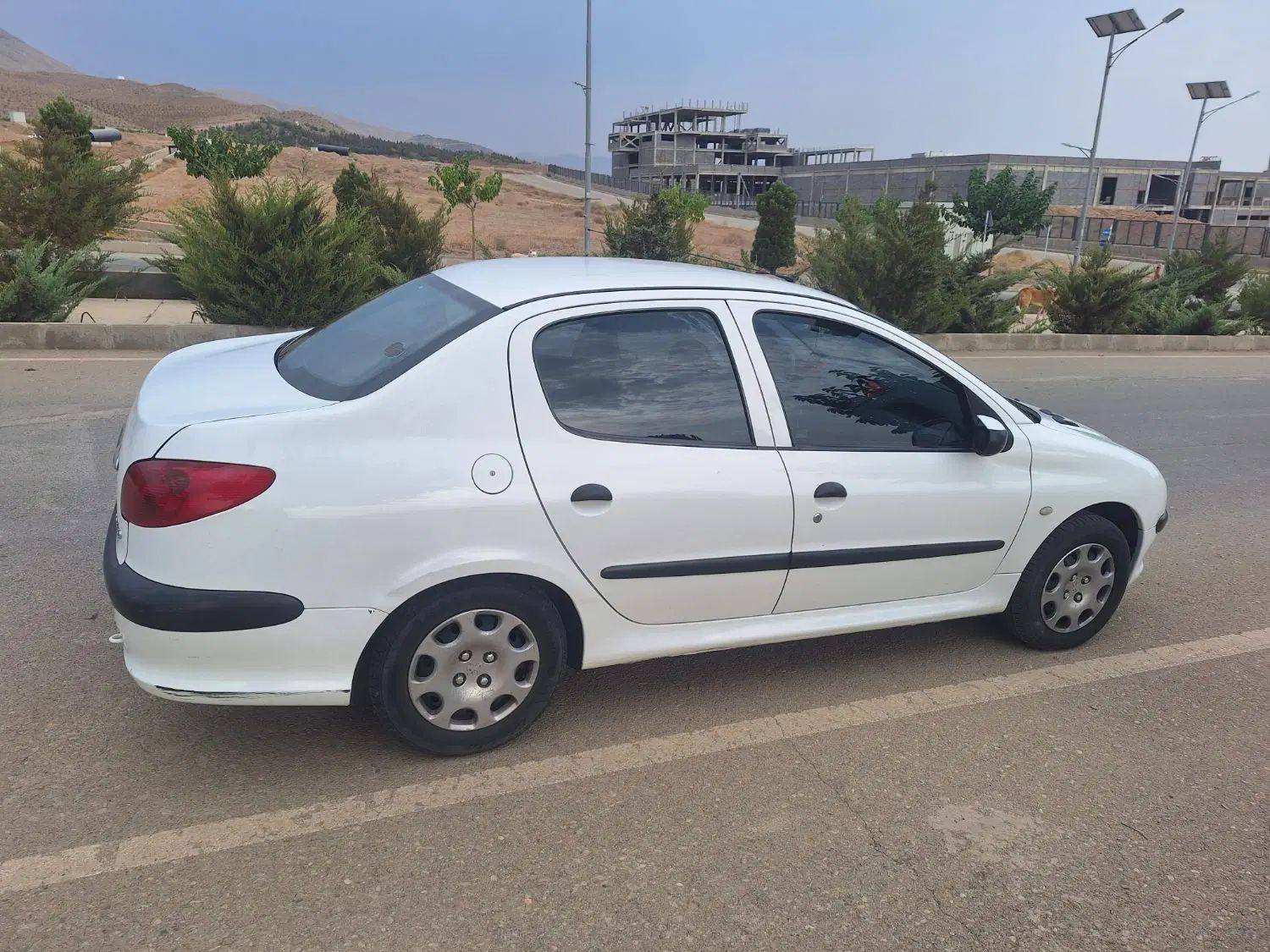 پژو ۲۰۶ صندوق دار v8 - 1395