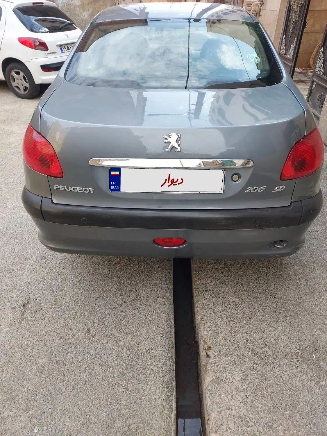 پژو ۲۰۶ صندوق دار v8 - 1394