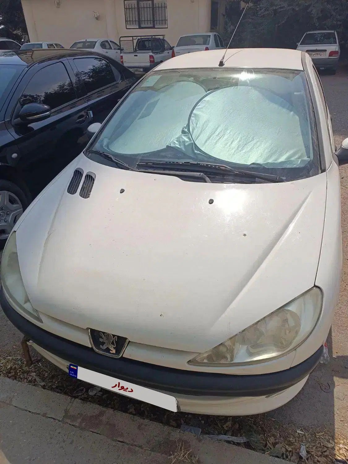 پژو ۲۰۶ صندوق دار v8 - 1396