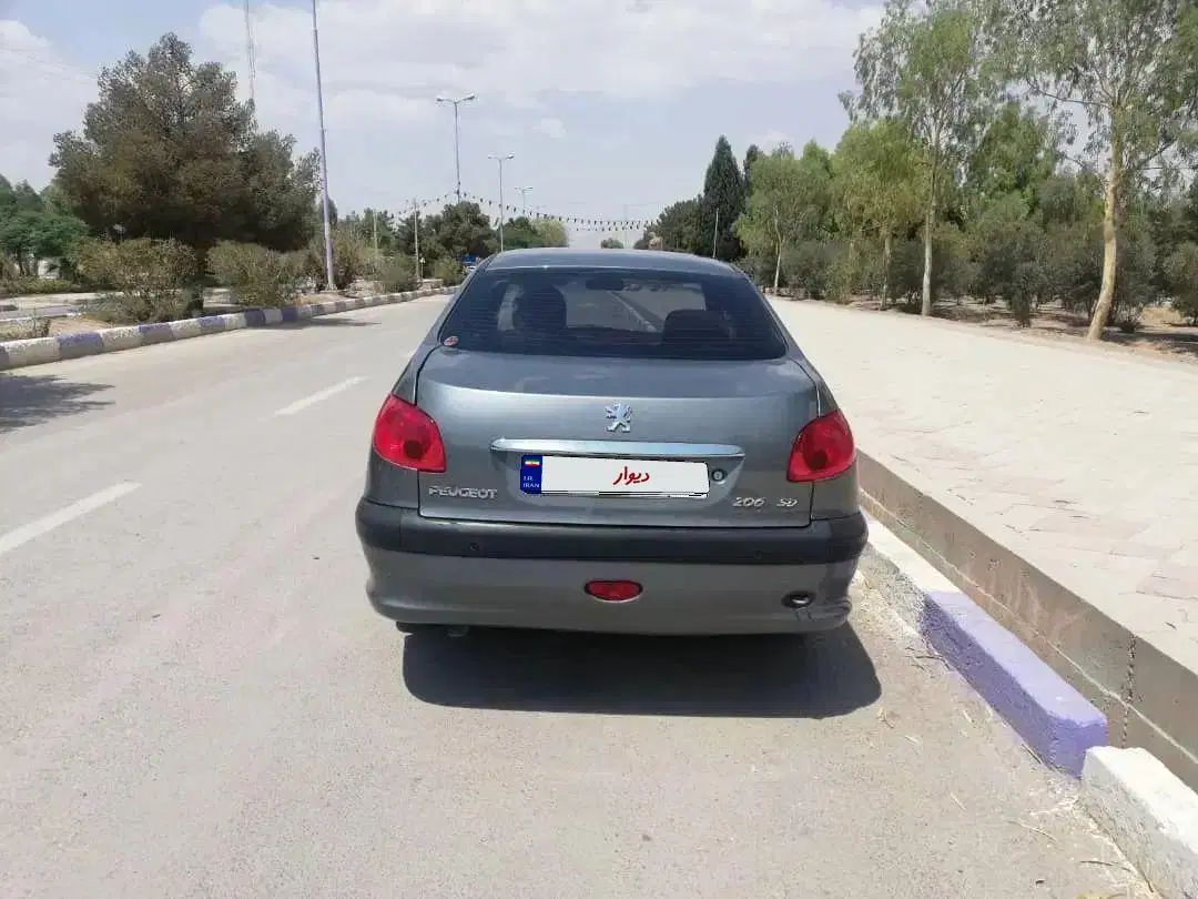 پژو ۲۰۶ صندوق دار v8 - 1396