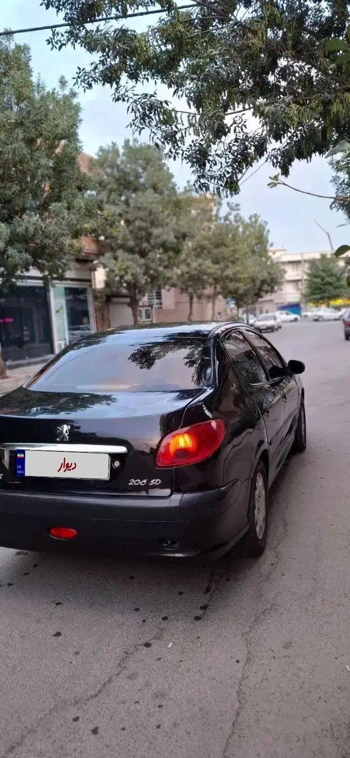 پژو ۲۰۶ صندوق دار v8 - 1391