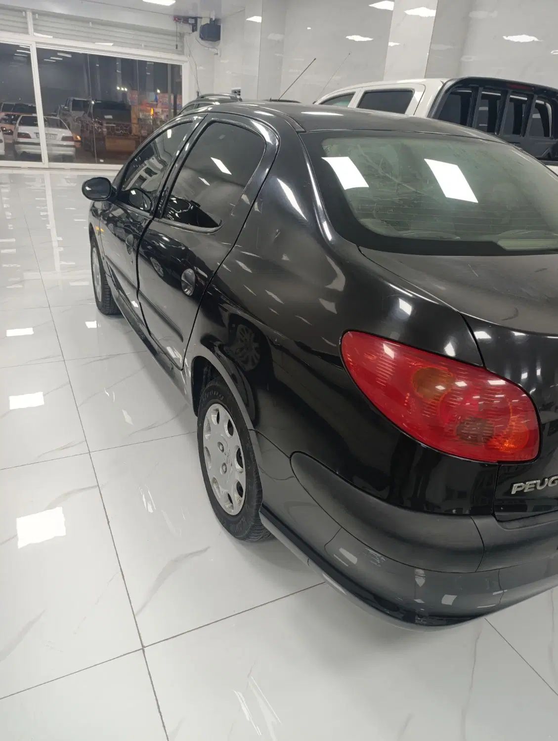 پژو ۲۰۶ صندوق دار v8 - 1394