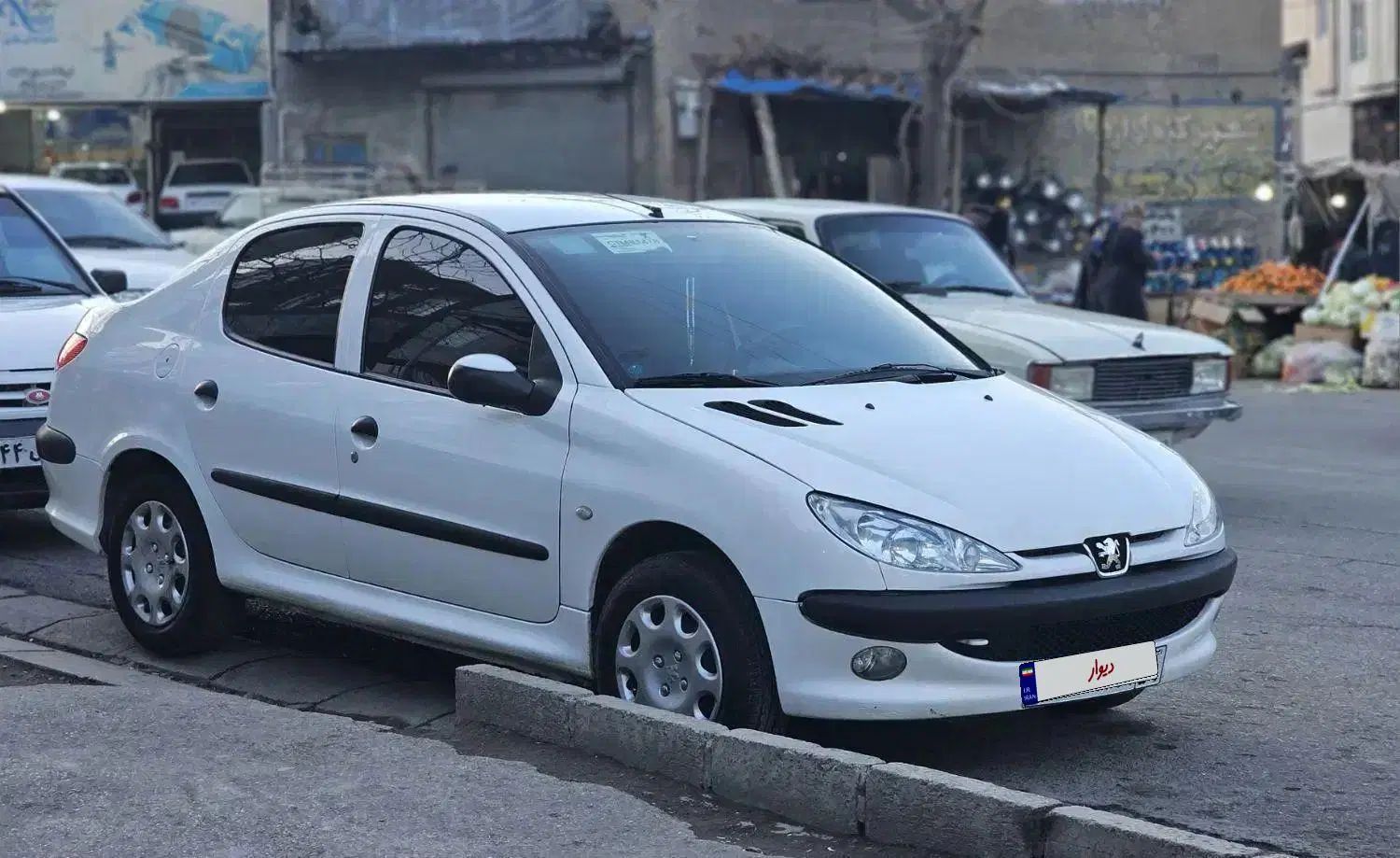 پژو ۲۰۶ صندوق دار v8 - 1396