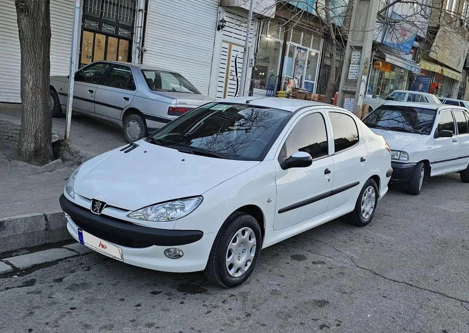 پژو ۲۰۶ صندوق دار v8 - 1396