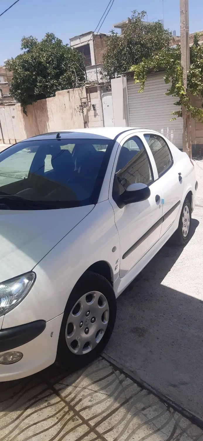 پژو ۲۰۶ صندوق دار v8 - 1396