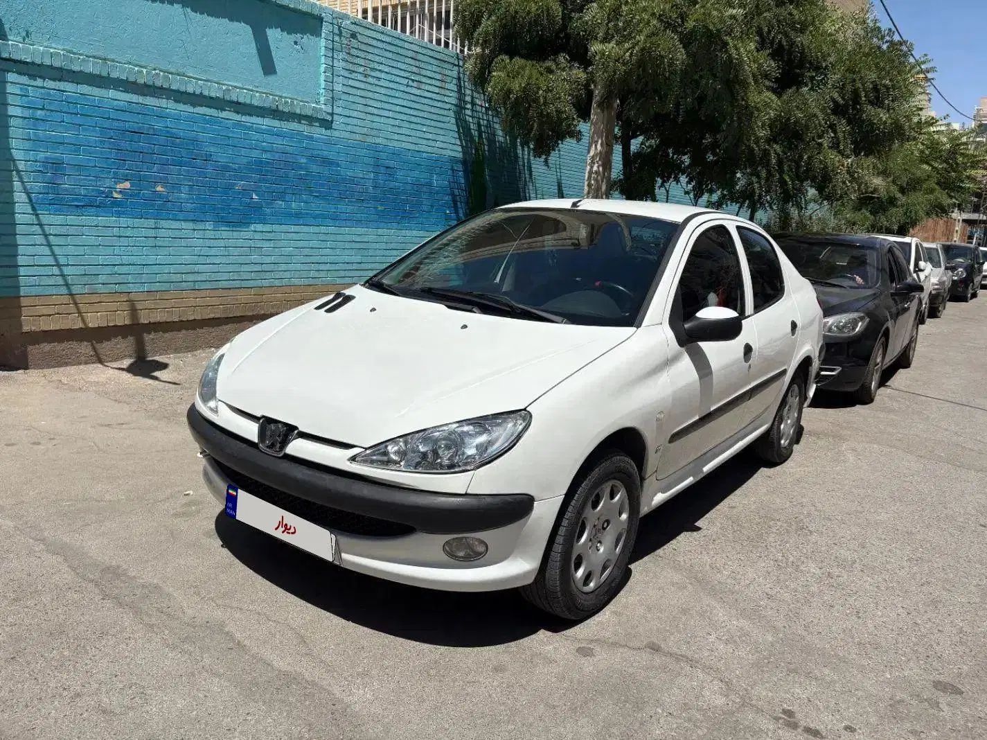 پژو ۲۰۶ صندوق دار v8 - 1395