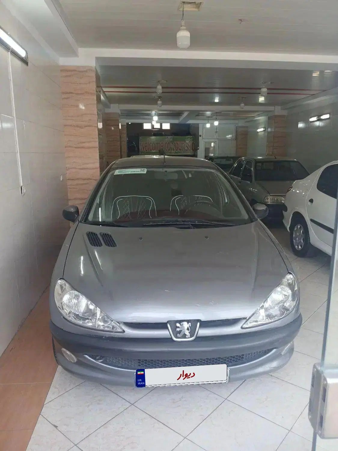پژو ۲۰۶ صندوق دار v8 - 1390