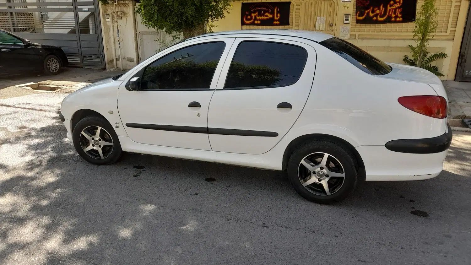 پژو ۲۰۶ صندوق دار v8 - 1395