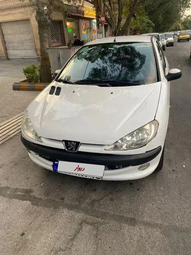 پژو ۲۰۶ صندوق دار v8 - 1397