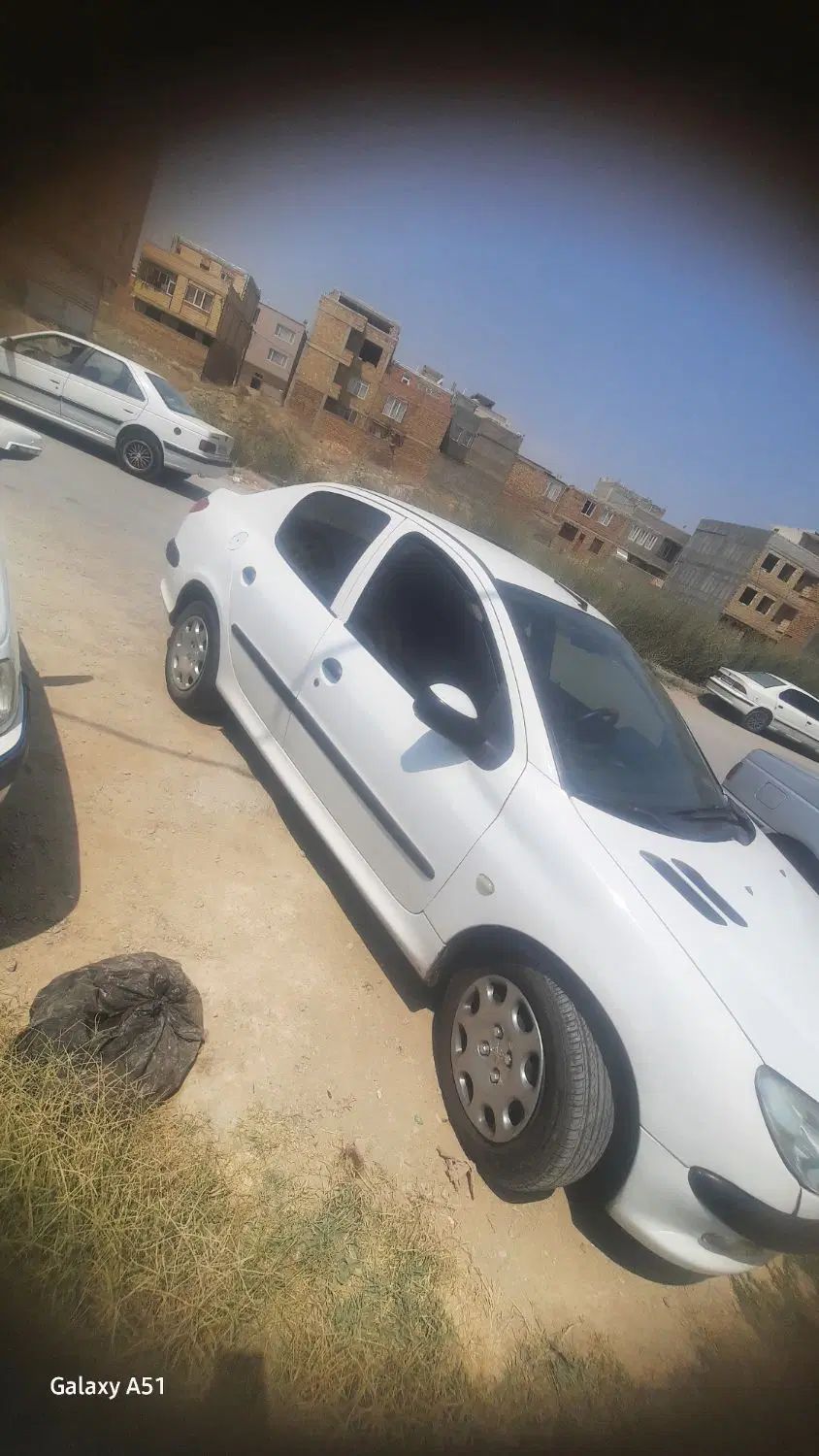 پژو ۲۰۶ صندوق دار v8 - 1396