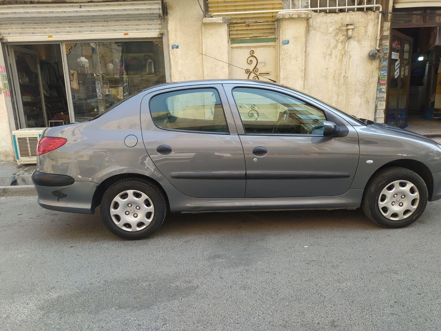 پژو ۲۰۶ صندوق دار v8 - 1391